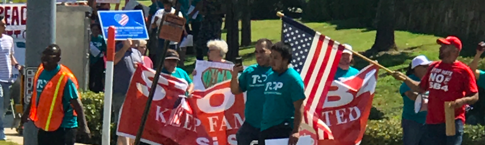 Pro-DACA Protesters Shout At Paxton’s House